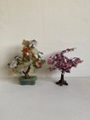A 20th century Chinese carved soapstone bonsai tree along with a similar cherry blossom example. H.