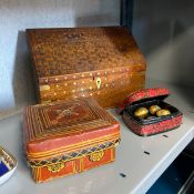 Three items to include a brass inlaid stationery box, an Eastern hand painted and woven lidded