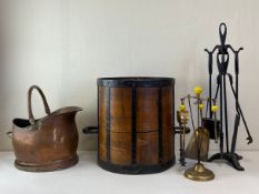 A collection of items to include a copper coal scuttle, a wrought iron and bentwood basket and two