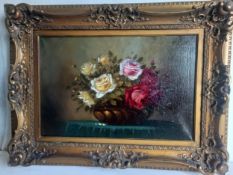 An early 20th century on canvas, Dutch school still life roses in a copper bowl, signed to the lower