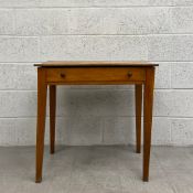 A 20th century satinwood side table having a rectangular plank top over a single frieze drawer