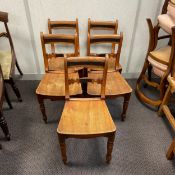 A set of five 19th century elm Essex bar back dining chairs each having a shaped ebonised top rail