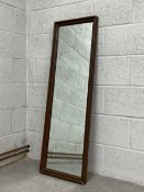 A 20th century floor standing mirror having a rectangular plate in a painted and moulded frame. H.