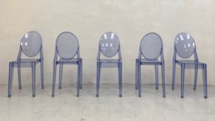 A set of five transparent blue shock and weatherproof polycarbonate Louis Ghost chairs designed by