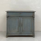 A late 19th century painted pine French side cupboard having a rectangular patinated plank top