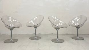 A set of four Eros chairs by Phillipe Starck for Kartell each having a clear polycarbonate bucket