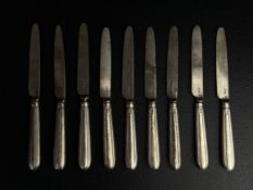 A set of nine silver hallmarked late 18th or early 19th century Georgian knives. Weight:517g L.21cm