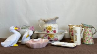 A mixed collection of ceramics to include two figural porcelain ducks, a Victorian jug and wash