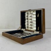 A 20th century silver plated cutlery set with mother of pearl handles comprised of six knives and