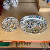 A 19th century Davenport 'Flying Bird' pattern platter and tea plate with marks to the base. L.31.