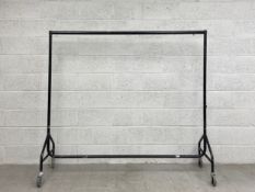 A vintage industrial metal clothes rail on castors. H.155 W.185 D.51cm
