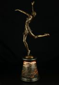 After Bruno Zach (1891-1935), an Art Deco patinated bronze figure titled 'Dancing Girl', signed to