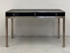 A mid century chrome and black lacquered console table having a rectangular top over three frieze