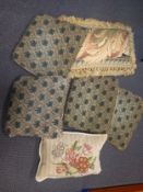 A mixed lot of tapestry cushions. Longest 60cm