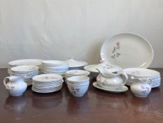 A Royal Doulton Pillar Rose pattern part tea and dinner service for twelve place settings to include