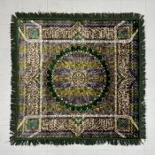A vintage Moroccan Manatex wall hanging rug having a central mandala or flowerhead medallion