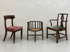 A William IV side chair with a curved back and pink velour upholstered stuff-over seat raised on