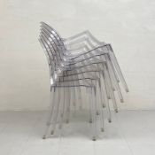 A set of six clear shock and weatherproof polycarbonate Louis Ghost armchairs designed by Phillipe