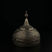 A 19th century Indian white metal Kutch silver spice Pandan or Khaas Daan box of domed form with a