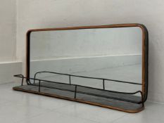 A vintage style wall hanging bathroom or hall mirror having a rectangular plate with curved