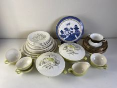 A Grindley 'Florentine Lily' pattern dinner service, twelve Wedgwood bone china dishes and one