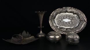 A mixed collection of 19th century and later Indian white metal Kutch silver to include a thin