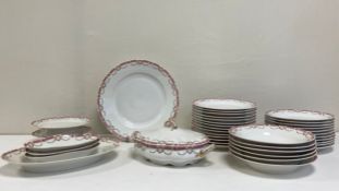 A thirty nine piece part dinner service to include a lidded tureen, five serving dished and