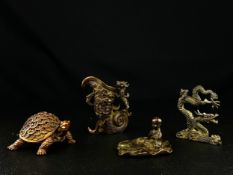 A mixed collection of Japanese bronze figural items to include a lidded tortoise censer, a five
