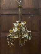 An early 20th century gilt metal bouquet chandelier having a wheatsheaf armature with scrolling