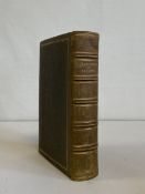 A first edition gilt and tooled green calf leather bound copy of Bleak House by Charles Dickens with