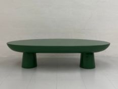 A contemporary green lacquered fibreglass Tabata coffee table by Popus Editions having an oval top