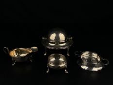 A mixed collection of hallmarked silver to include a .900 German silver domed and footed roll-top
