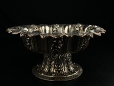 A 19th century Indian repousse white metal Kutch silver centrepiece bowl having a lobed and openwork