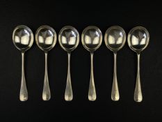 A set of six silver hallmarked soup spoons with engraved initials by Walker & Hall, Sheffield