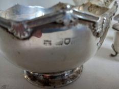 A mixed collection of hallmarked silver to include a pair of pierced bonbon dishes and another