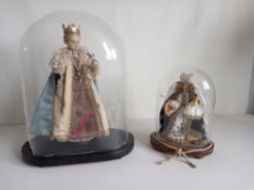 A 19th century wax figure modelled in the manner of th Infant Jesus of Prague depicting the Child