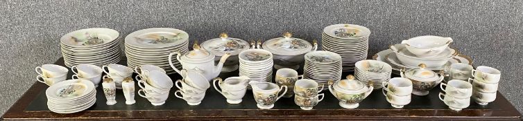 An extensive Japanese dinner service to include thirteen dinner plates, hand painted and marked to