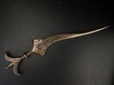 A 17th or 18th century Indian Mughal era wootz-Damascus steel Chilanum dagger having an