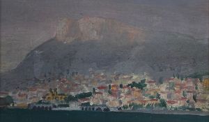 A 20th century oil on board, view of a Continental town with mountains in the distance, framed and