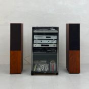 A vintage stereo system in a fitted glazed cabinet comprised of a JVC model L-F66 turntable, a Creek