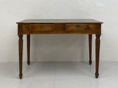 A 19th century French chestnut side table having a rectangular plank top over two short frieze