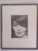 A 20th century portrait photograph of a lady, possibly a film headshot, framed and glazed. 49x39cm.