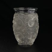 A 20th century clear and frosted Bagatelle glass vase decorated in relief with birds in foliate