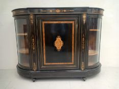 A late 19th century ebonised credenza having a curved and break-fronted top with a marquetry