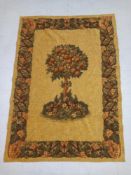 A 20th century Belgian style chenille needlework tapestry having a central orange tree motif over