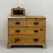 A C.1900 pine washstand having a pine and white marble top with a shaped and tiled partial gallery