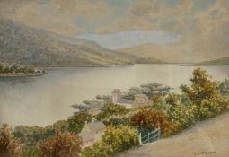 An early 20th century watercolour on paper depicting a village on a large lake with mountains in the