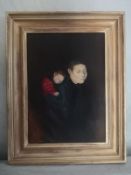 A 20th century oil on canvas laid board depicting a stylised mother and child in a gilt frame.