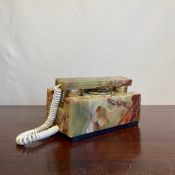 A vintage onyx and brass telephone by Telart Viareggio. L.23cm