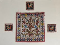 Four vintage Indian Gujarat beadwork panels to include one with all-over geometric floral designs